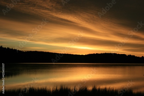 sunrise over the lake © AnsisJnis