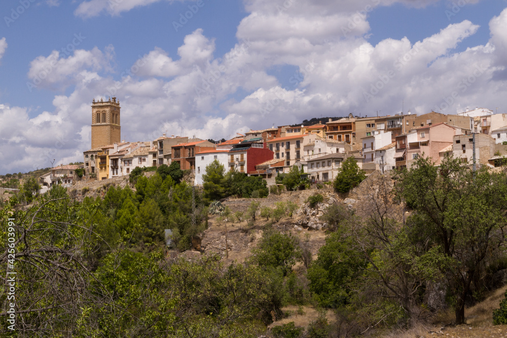 Scenic of a Town on Top of a HIll