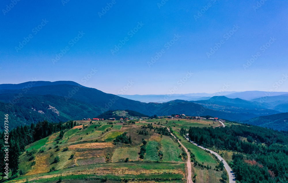 Village in a mountain landscape. Europe, Bulgaria, Bansko. Ski resort city panoramic view.
