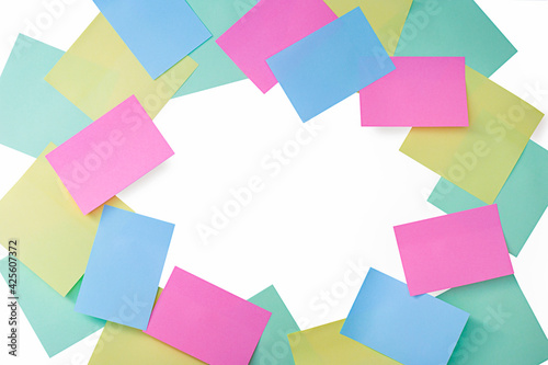 Colorful sheets of paper for notes and reminders, isolated on a white background.