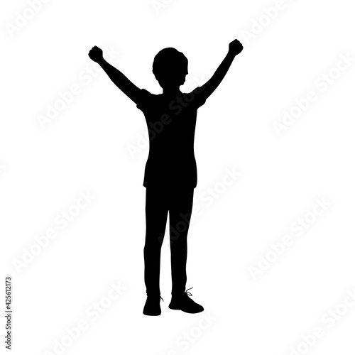 Silhouette boy with raised fists success victory