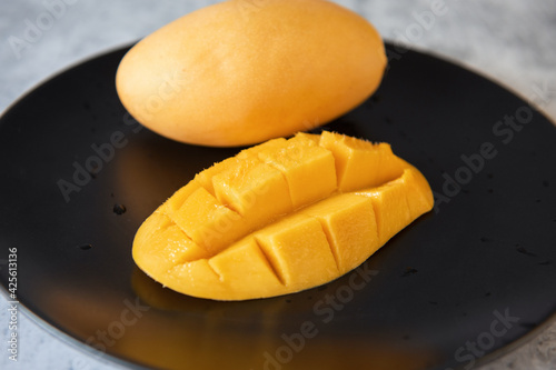 Fresh yellow mango fruit in...