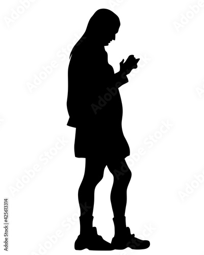 Man in a business suit is talking on a cell phone. Isolated silhouettes on a white background