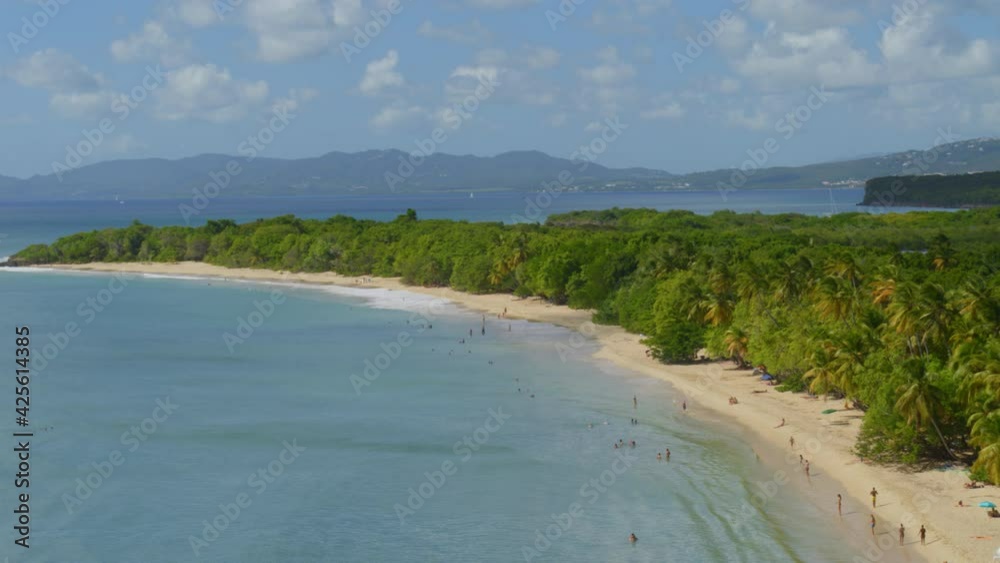 Aerial of tourist on beautiful sea coast at Grande-Anse, les Saintes Aerial of tourist on beautiful sea coast at Grande-Anse, les Saintes