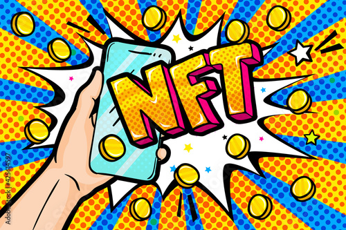 Concept of non fungible token. Hand holding a phone with Text NFT. Pay for unique collectibles in games or art.