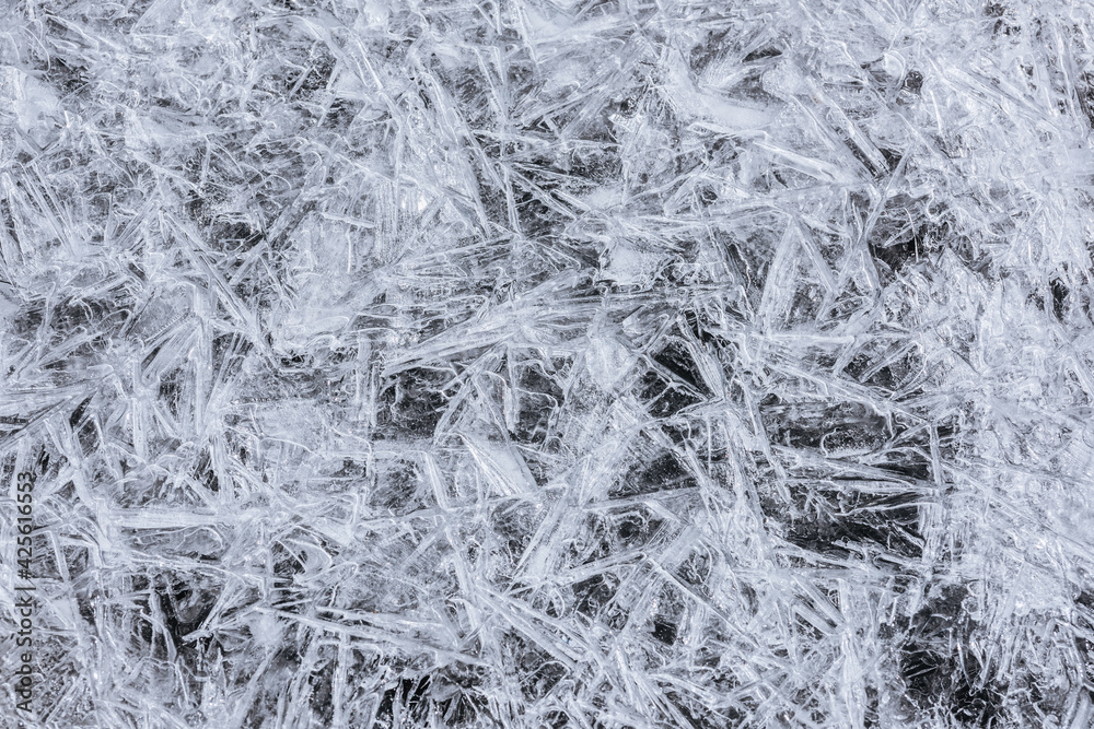 The texture of the thin ice on the water surface The texture of the thin ice on the water surface