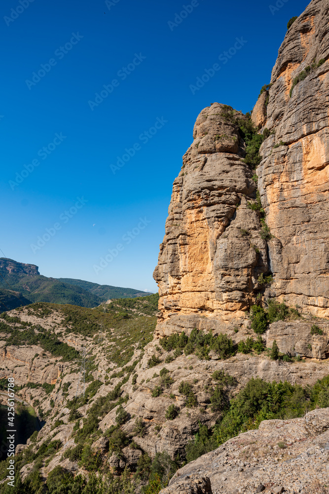 Gorge of Collegats in the Pyrenees. In the middle of spring. On a sunny day with no clouds in the sky and a completely blue sky.