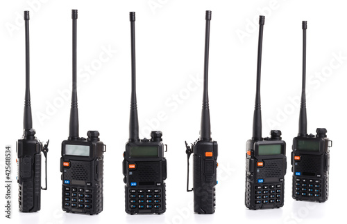 set collage of several black walkie-talkie radio communication device isolated on white background photo