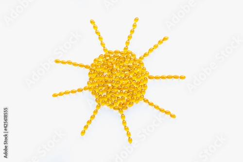 vitamins d3 on a white background, the sun on a white background 