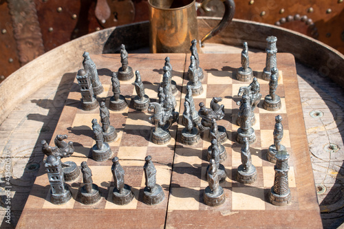 ancient arabic chess with iron pieces