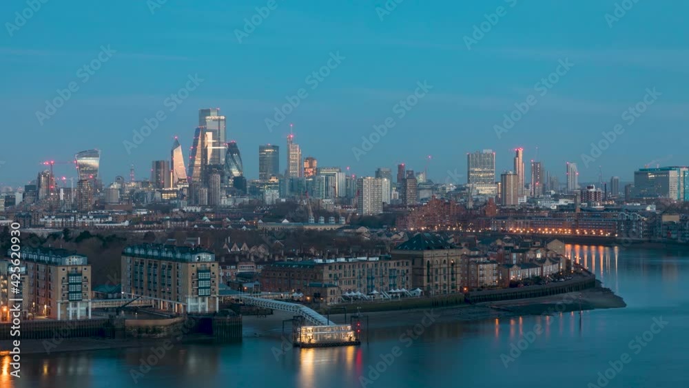Sunrise to day time lapse view to the urban skyline of the City of London, United Kingdom