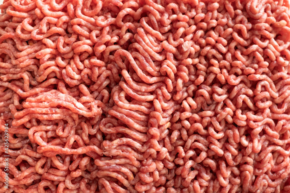 texture of minced meat, close-up of minced veal, minced pork, ground pork texture of minced meat, close-up of minced veal, minced pork, ground pork