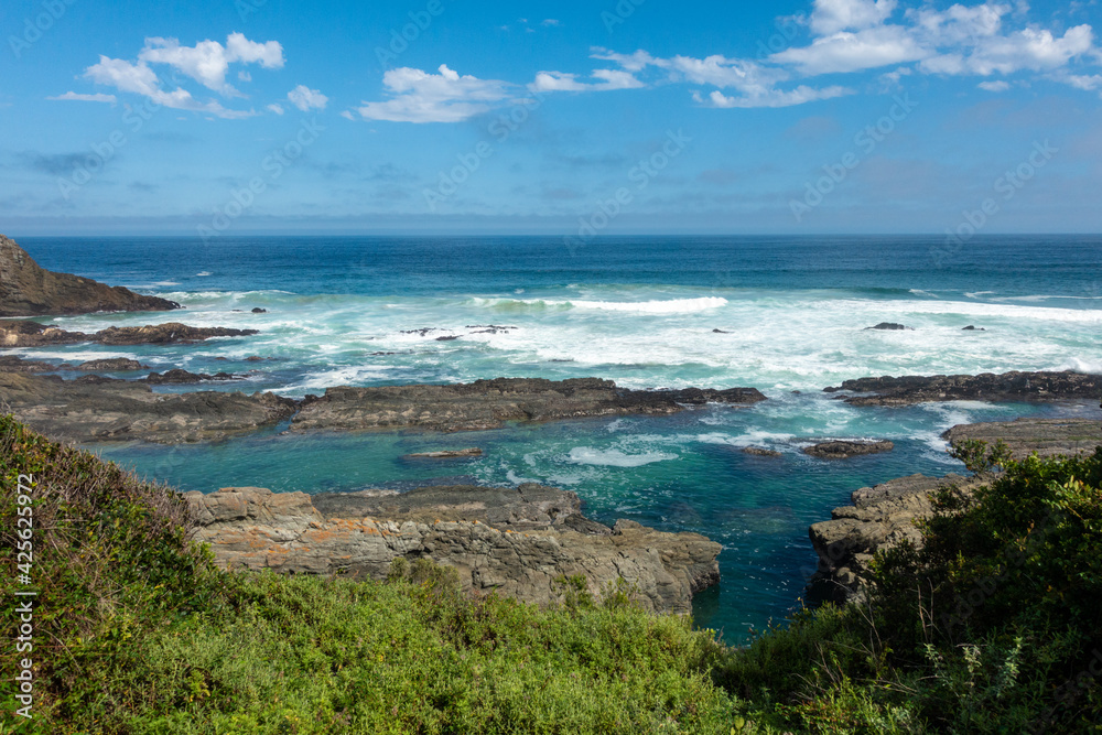 Rocky coastline at the Tsitsikamma National Park, South Africa Rocky coastline at the Tsitsikamma National Park, South Africa