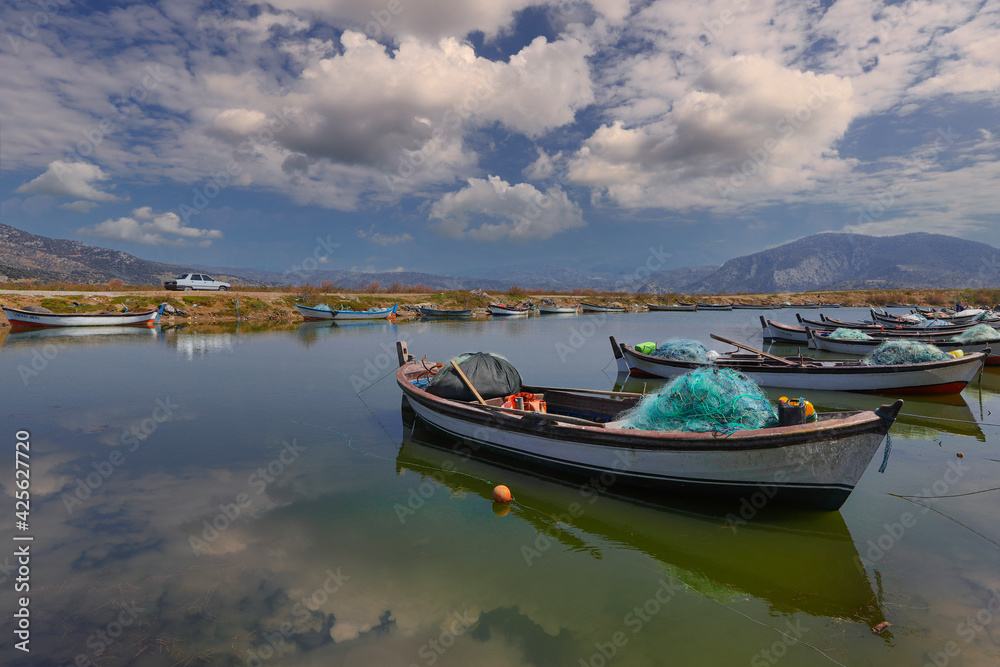 (Aydın - Turkey 03.April .2021) Serçin village. Fishing boats waiting in the creek at lake bafa