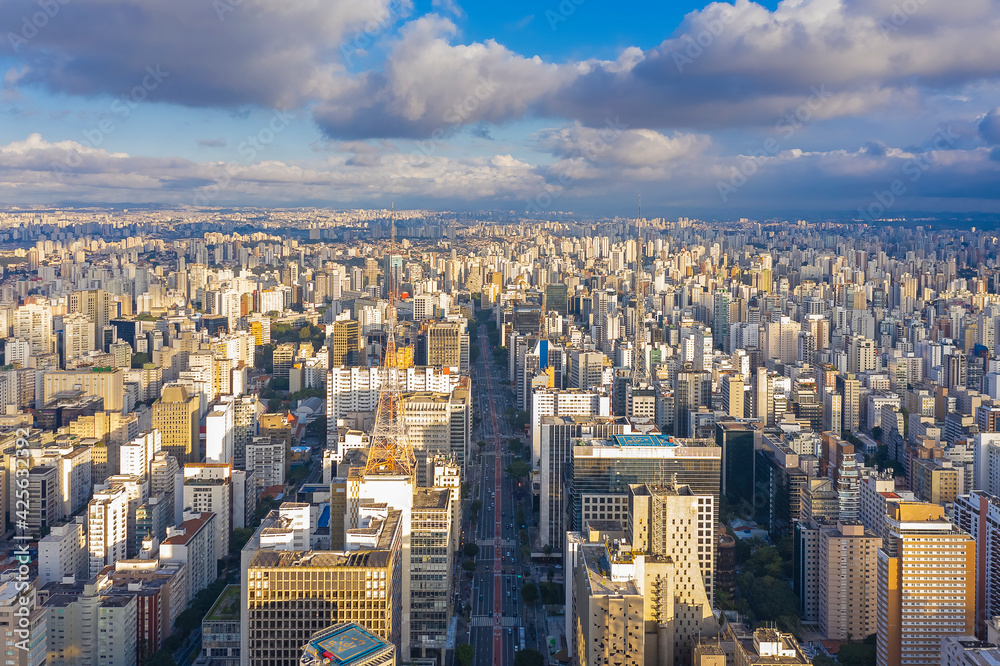 Paulista avenue seen from the top in São Paulo, SP, Brazil, sunset with clouds