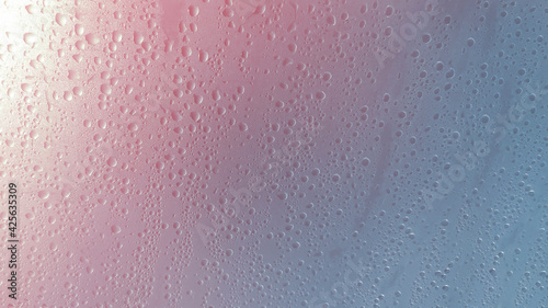 Water droplets on the film.