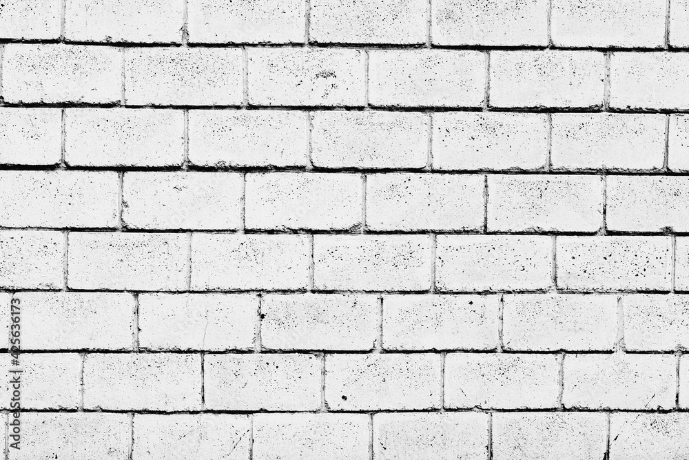 Obraz premium Texture of a brick wall with cracks and scratches which can be used as a background