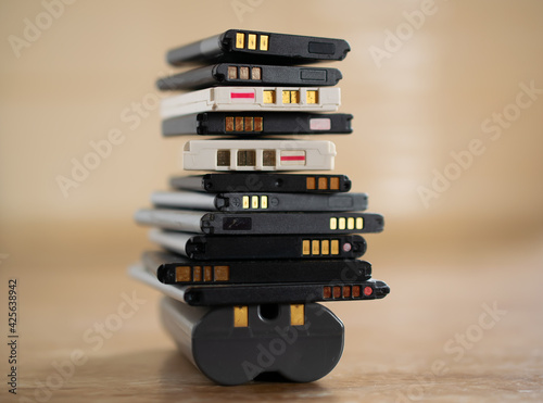 cell phone batteries. stacked. battery recycling. recovery of copper, gold, lithium