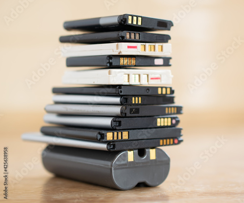 cell phone batteries. stacked. battery recycling. recovery of copper, gold, lithium