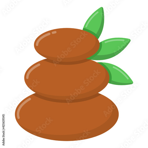 
A unique design of pile of stones with leaves, concept of spa stones 

