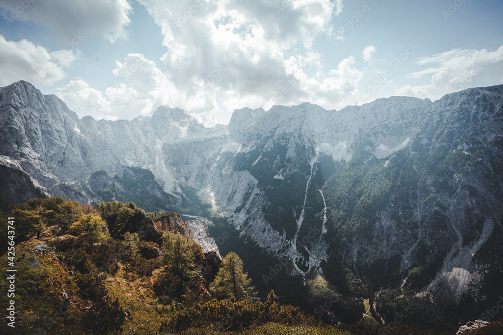 A beautiful panoramic landscape photo mountains during the noon hours in Triglav national park, Slovenia