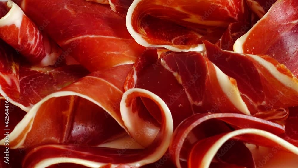 Jamon on the plate. Shooting in motion. Jamon on the plate. Shooting in motion.