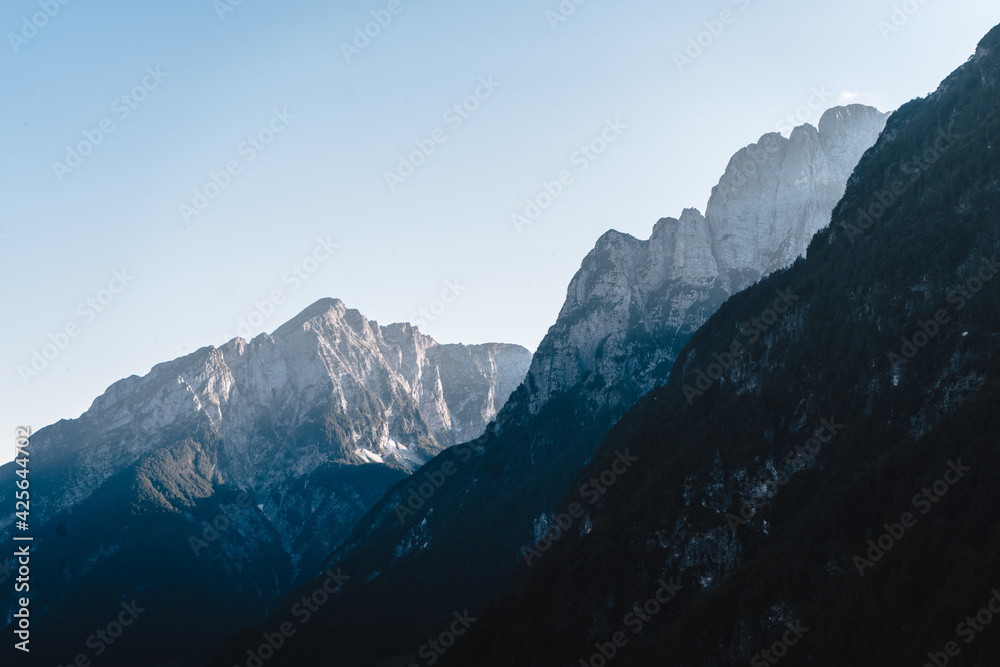 A beautiful panoramic landscape photo mountains during the evening hours on borders of Italia and Austria