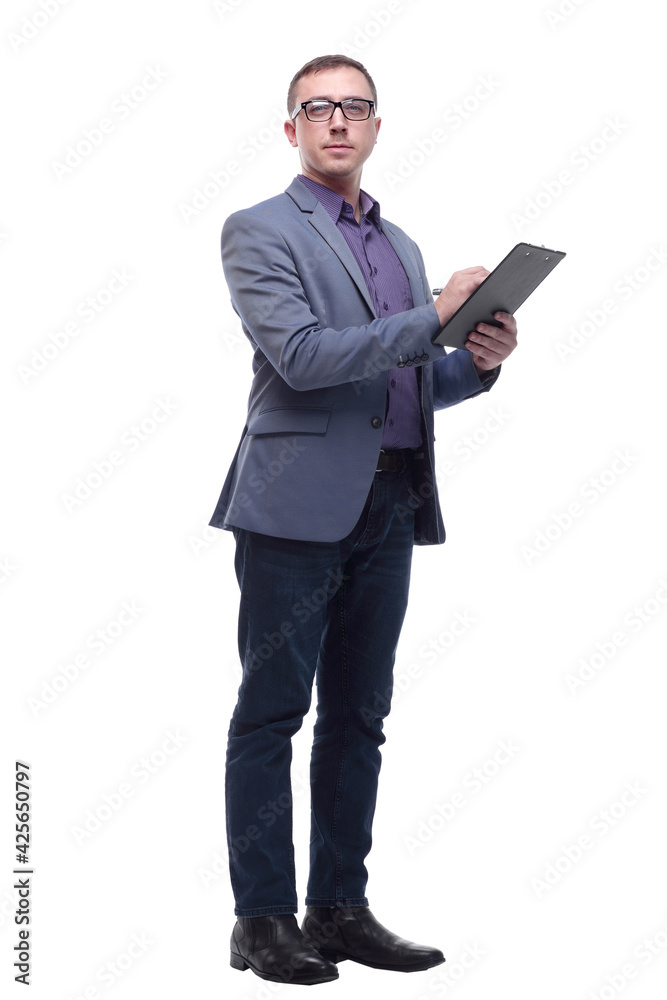 Handsome happy businessman or banker taking notes on clipboard as paperwork Handsome happy businessman or banker taking notes on clipboard as paperwork