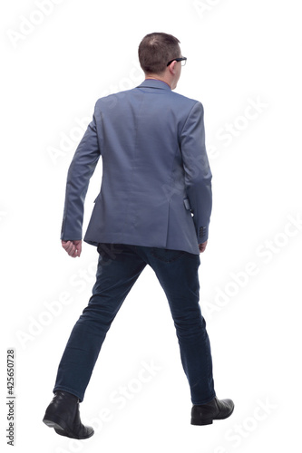 Back view of walking away business man