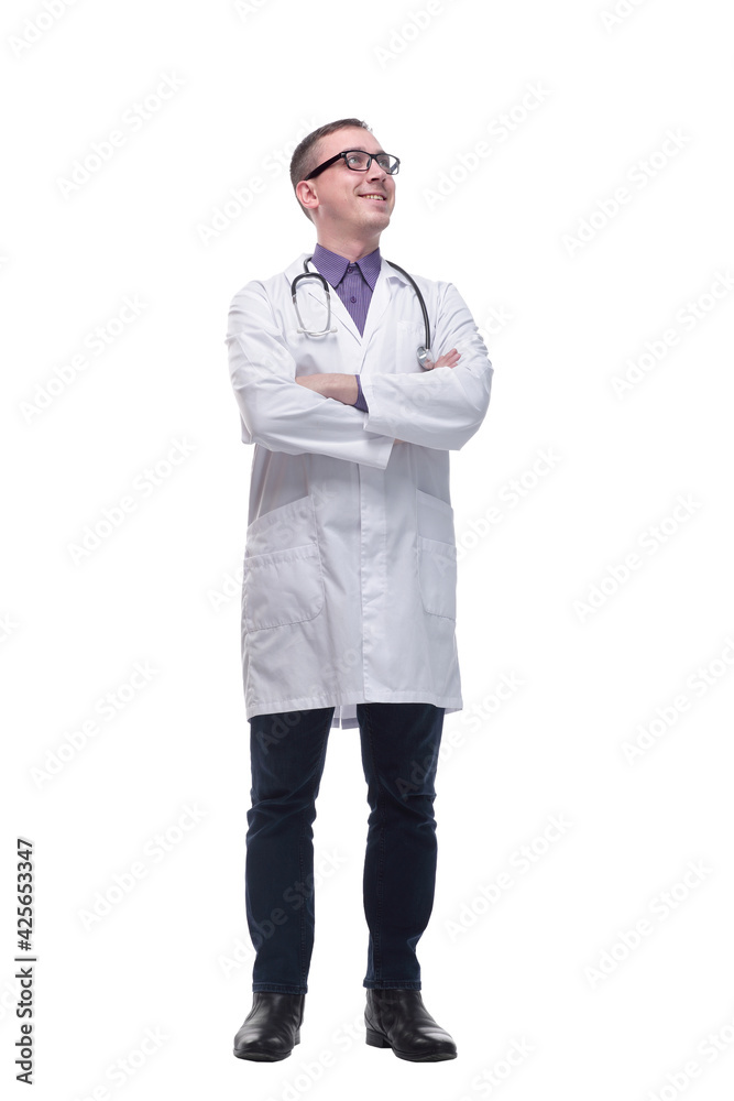 Smiling male doctor in scrubs with a stethoscope around his neck and his arms crossed Smiling male doctor in scrubs with a stethoscope around his neck and his arms crossed