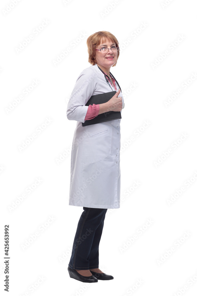 Portrait of senior female doctor holding clipboard looking at camera smiling Portrait of senior female doctor holding clipboard looking at camera smiling