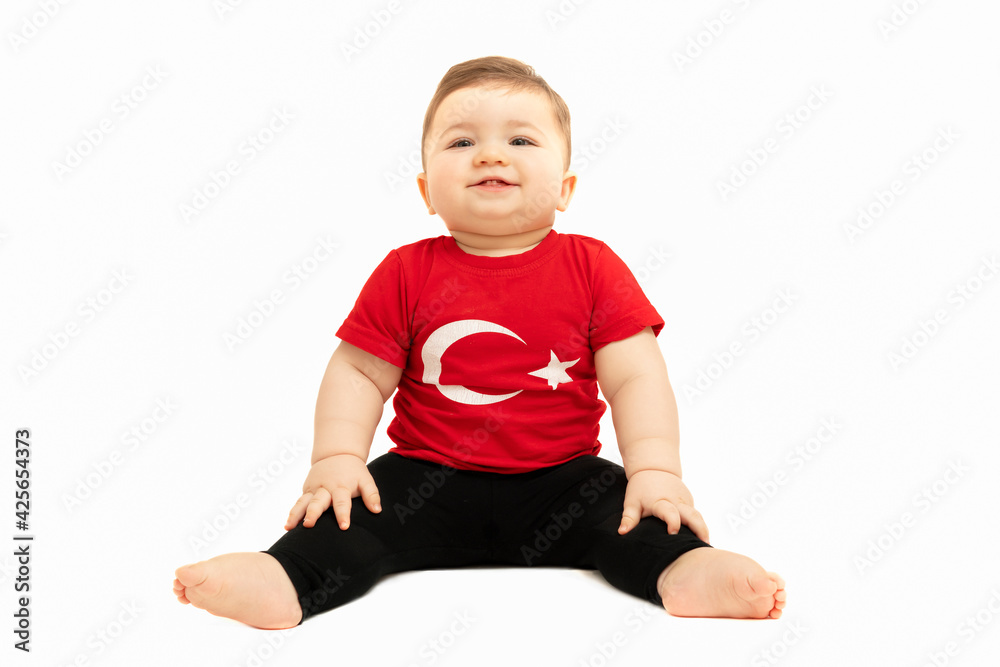 Portrait of happy little kid. Cute baby toddler with Turkish flag t-shirt. Adorable child isolated on white. Portrait of happy little kid. Cute baby toddler with Turkish flag t-shirt. Adorable child isolated on white.