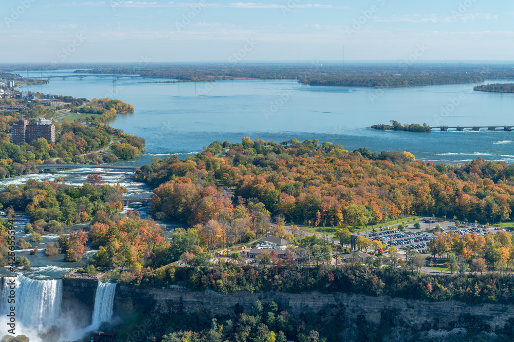 Beautiful autumn landscape with Niagara river, American Falls, and an island