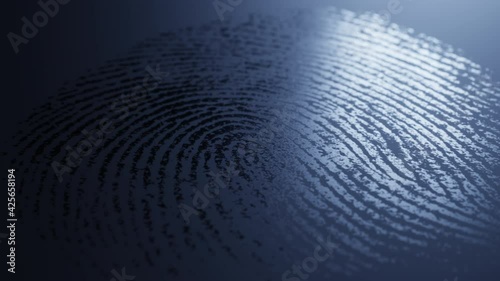 Closeup shot of fingerprint mark on dark blue surface visible in reflected light. Crime scene animation