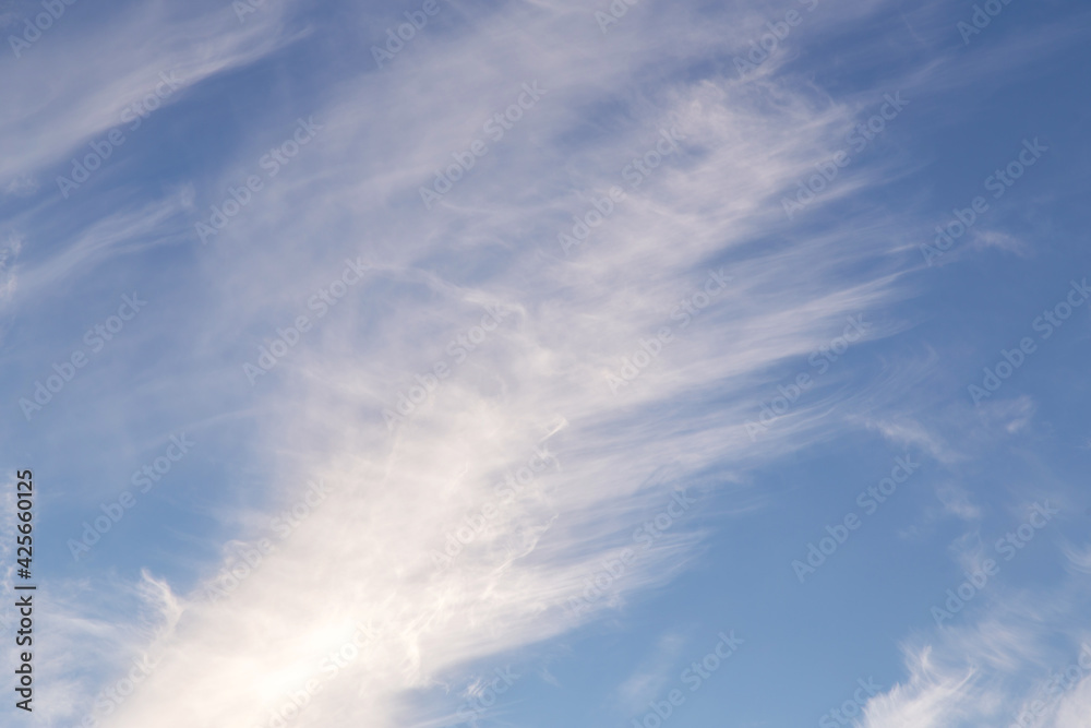 Abstract background clouds texture. Blue sky with white cirrus cloud