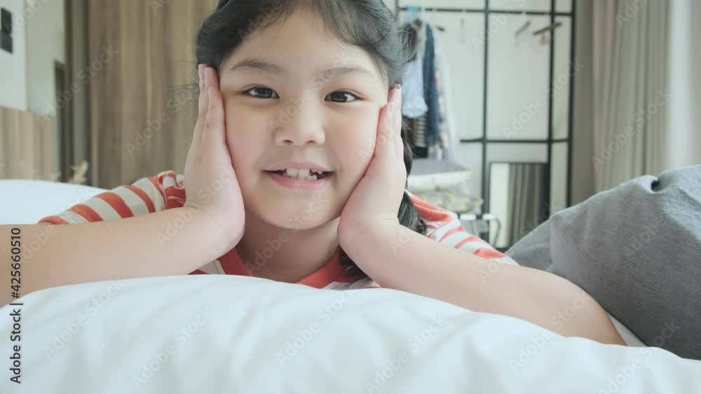 cute pretty young asian female casual cloth cozy fun play with cheerful and happiness on white soft bed 4k slow motion footage cute pretty young asian female casual cloth cozy fun play with cheerful and happiness on white soft bed 4k slow motion footage