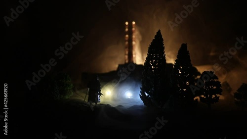 Creative artwork decoration. Chernobyl nuclear power plant at night. Layout of abandoned Chernobyl station after nuclear reactor explosion. Selective focus