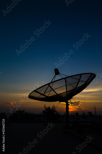 satellite dish at sunset