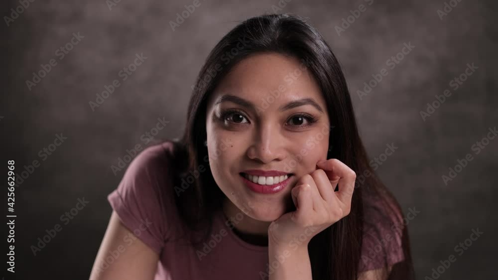 Young pretty woman posing for the camera - studio shooting Young pretty woman posing for the camera - studio shooting