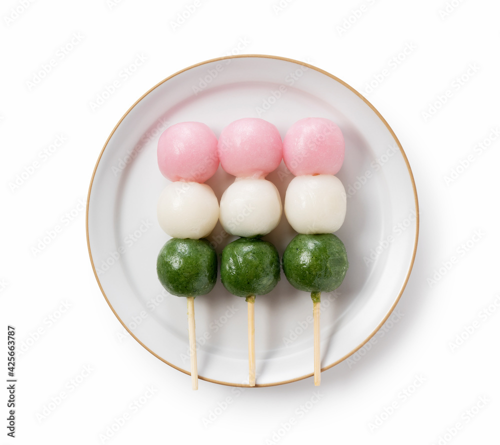 Tricolor dumplings placed on a white background. Tricolor dumplings placed on a white background.