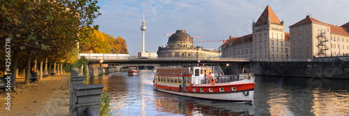 Photography Berlin, Spree river in Autumn with touristic boat
