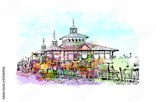 Building view with landmark of Eastbourne is a resort town on England. Watercolour splash with hand drawn sketch illustration in vector.