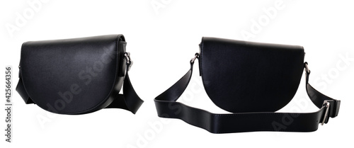 Fotografia Black women's handbag made of genuine leather with a wide shoulder strap