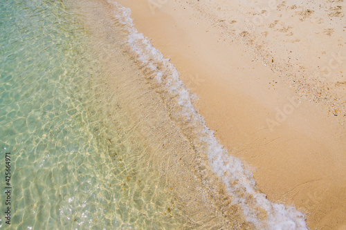 Fototapeta Naklejka Na Ścianę i Meble -  waves on the beach, The sea water in Thailand is crystal clear.