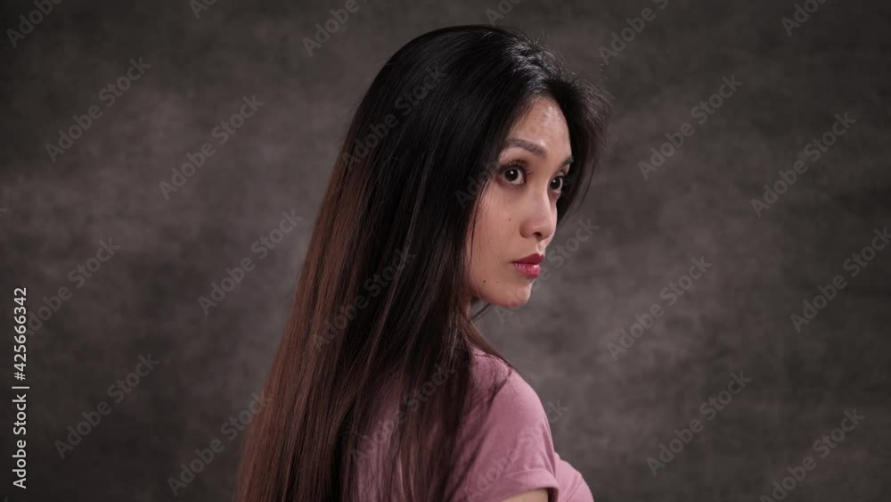 Portrait of a young pretty woman - studio shooting Portrait of a young pretty woman - studio shooting