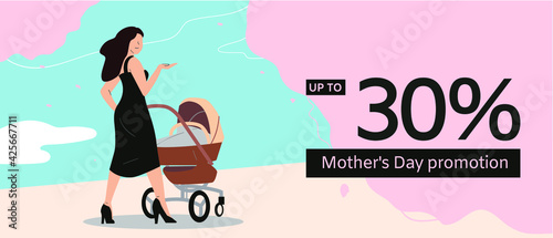 mother and baby -  A mother in a black sexy dress is walking with her baby in a stroller