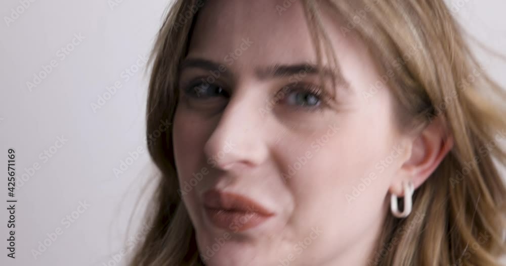 European white very beautiful girl with blue green eyes and blonde brown hair laughs sweetly into camera in 4k slowmotion.
face close-up. European white very beautiful girl with blue green eyes and blonde brown hair laughs sweetly into camera in 4k slowmotion.
face close-up.