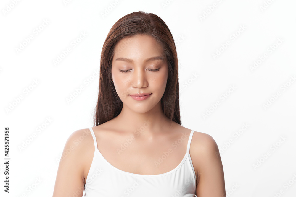Beautiful young asian woman with clean fresh skin on white background, Face care, Facial treatment, Cosmetology, beauty and spa, Asian women portrait Beautiful young asian woman with clean fresh skin on white background, Face care, Facial treatment, Cosmetology, beauty and spa, Asian women portrait