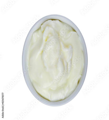 yogurt in white bowl on white background