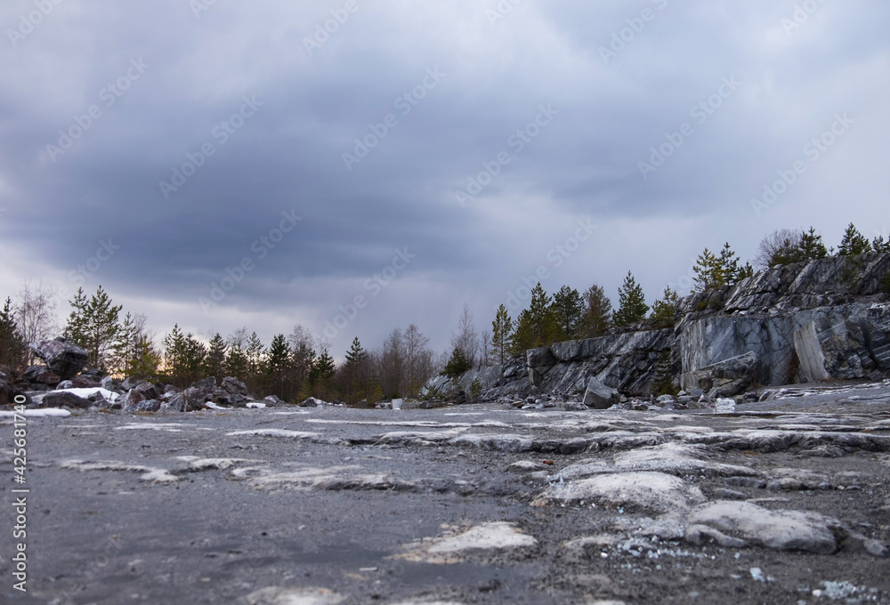 Ruskeala Mountain Park - Landmark of Russia. Marble mountain rock quarry winter landscape